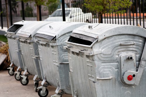 People disposing of old furniture in Plaistow